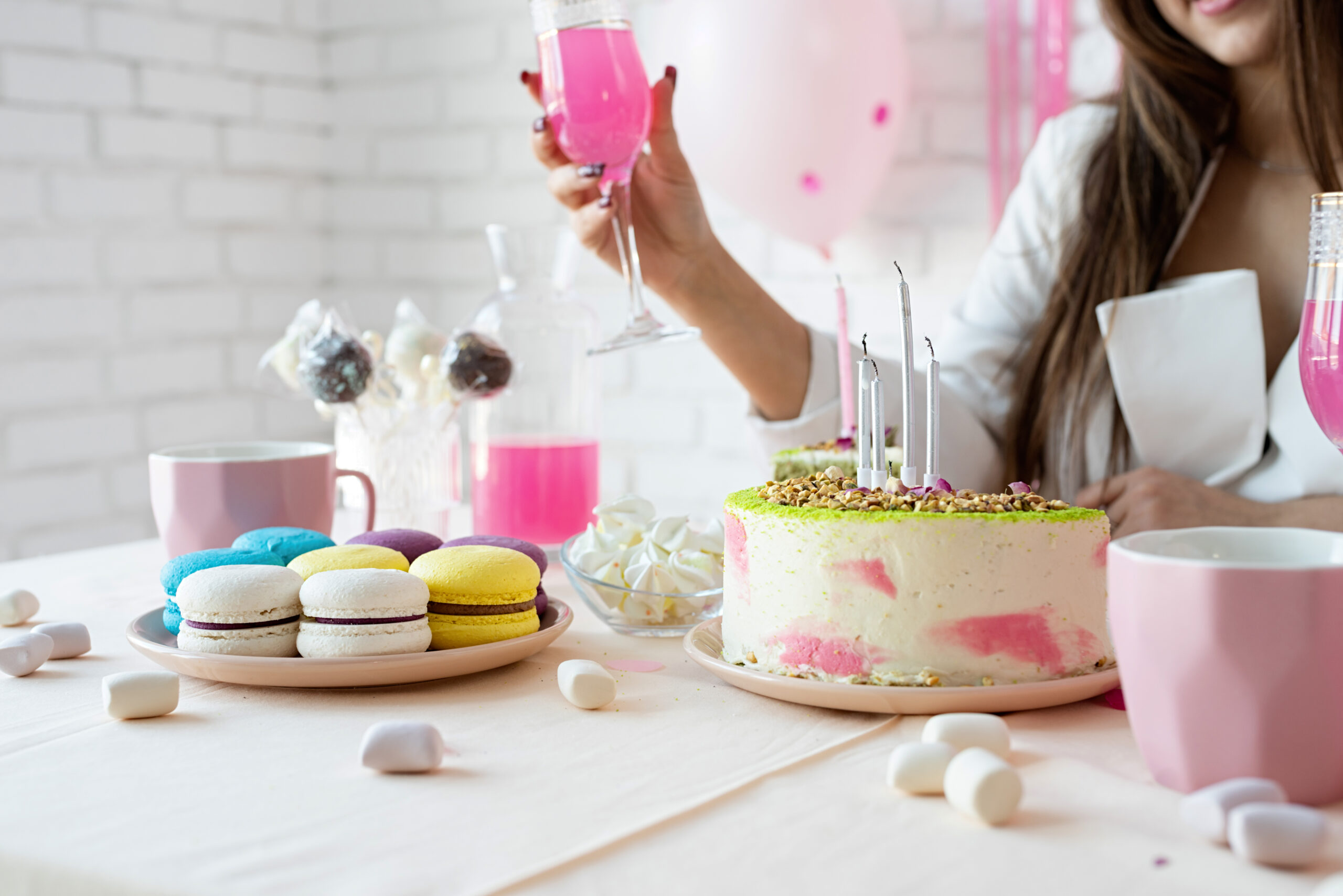 Beautiful woman celebrating birthday party having drink mixed links